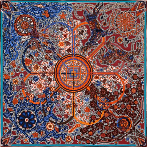 L'Arbre du Vent<br />Carré en twill de soie 100% soie, roulotté à la main (90 x 90 cm)<br />Coloris : brique/bleu/corail<br />Dessiné par Montserrat Gonzales-Lugo<br />Réf. : H002882S 13